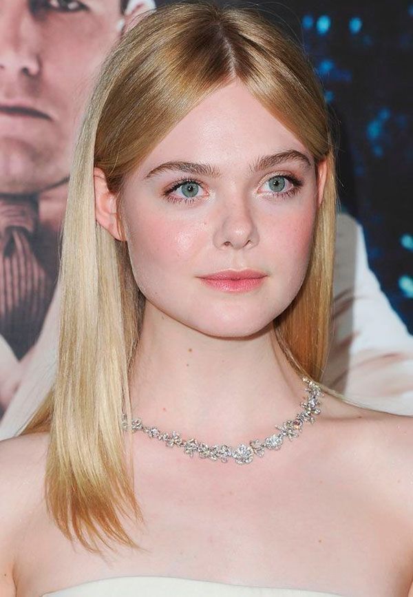 A close-up of Elle Fanning on the red carpet.