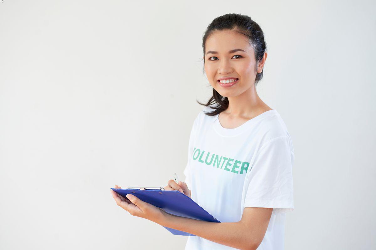 Young Asian woman volunteer 
