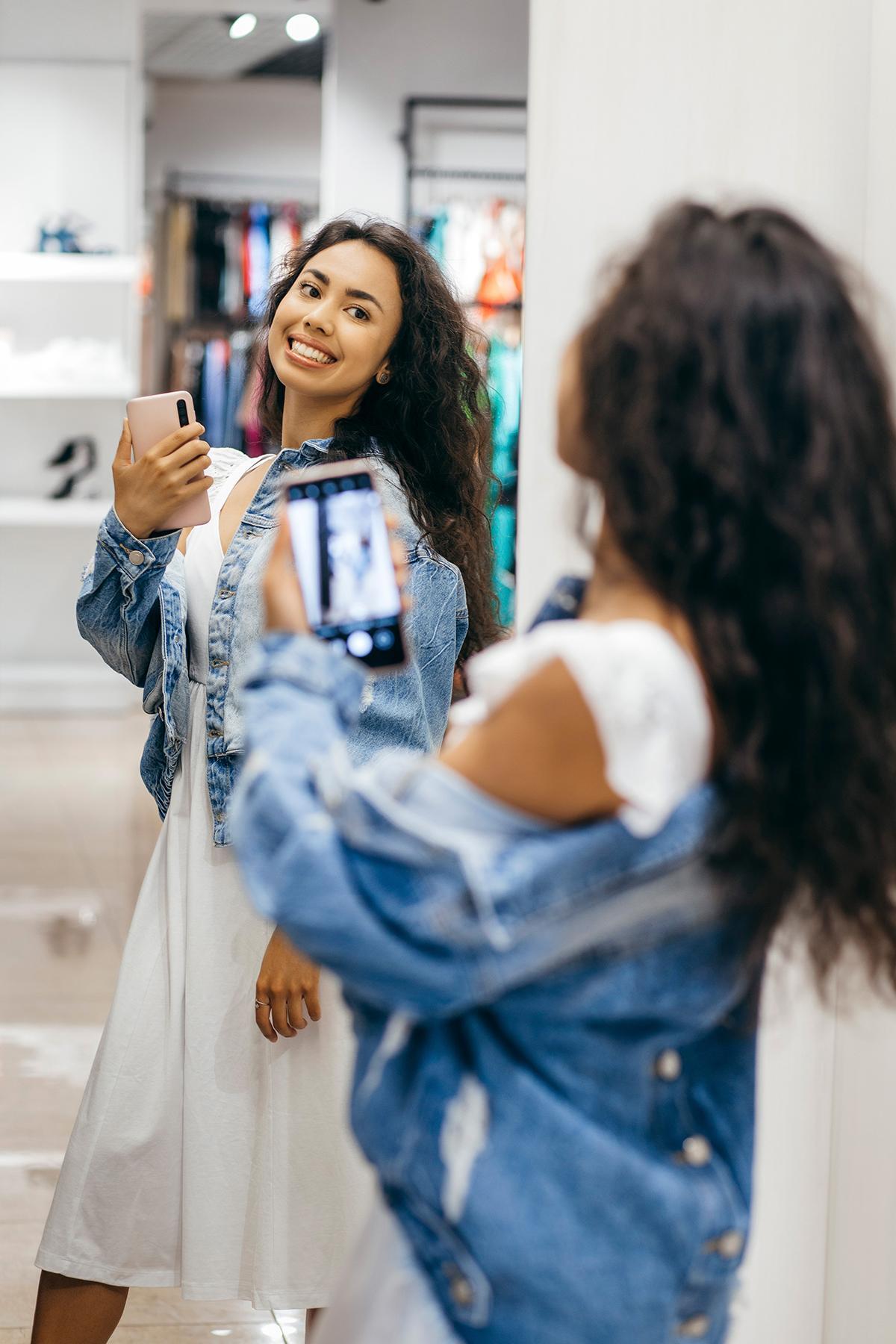 Woman taking a mirror selfie 