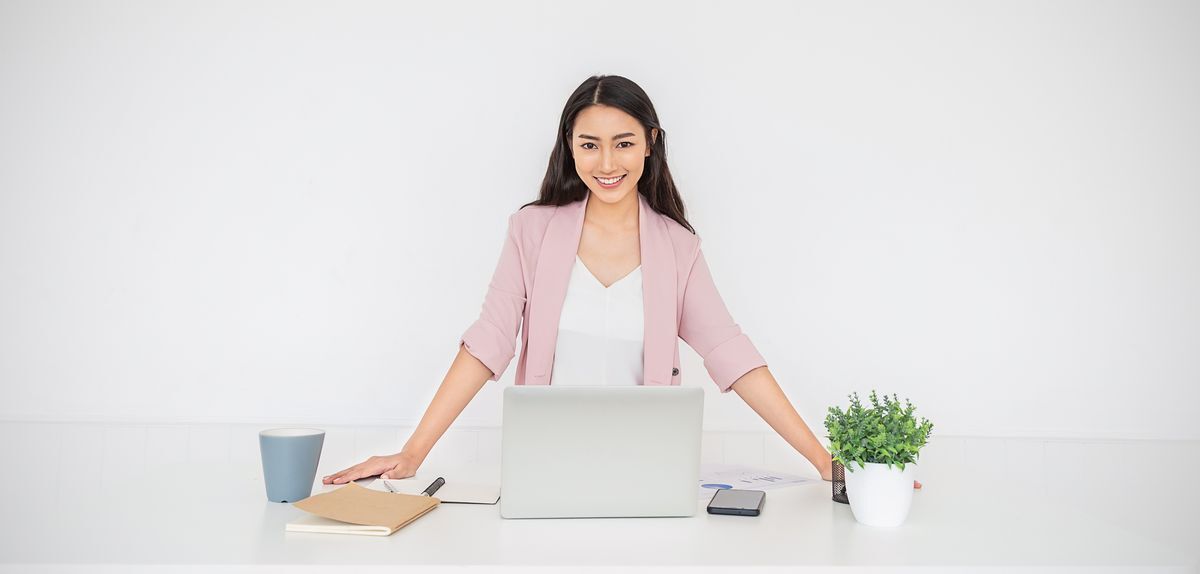 Asian woman looking powerful and happy