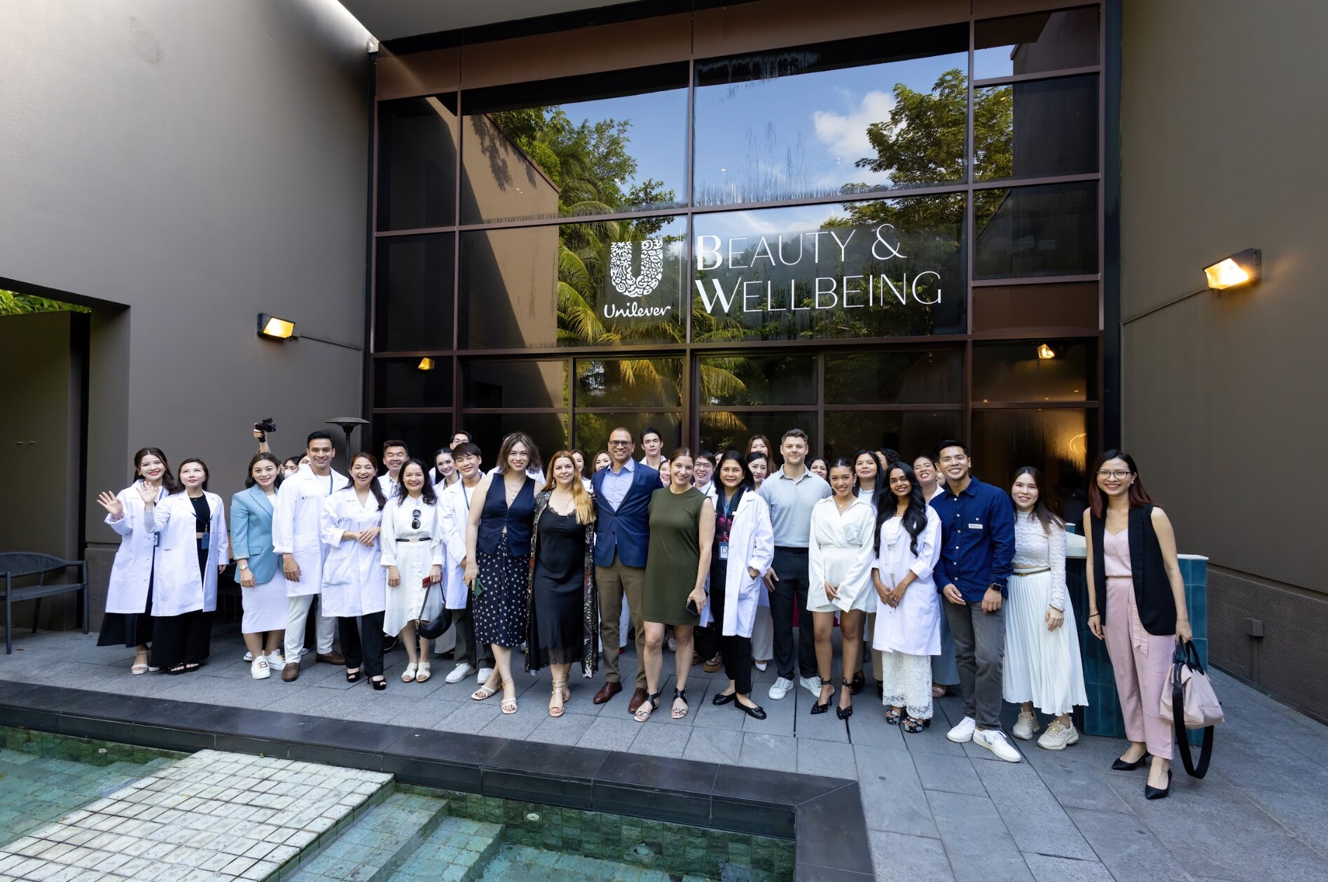 Asian dermatologists take a photo together.