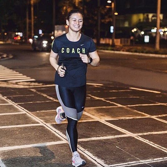 Multi sport athlete and physician Ian Banzon running outdoors in the evening