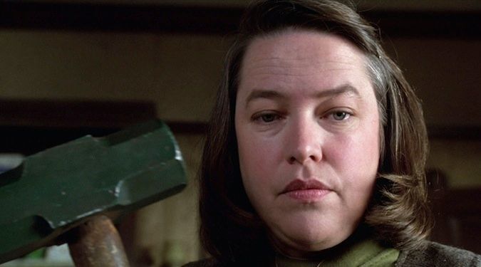 Part your chin-length bob from the side and clip it with an old-school hair pin to get Annie Wilkes’ look. (Source: IMDB)