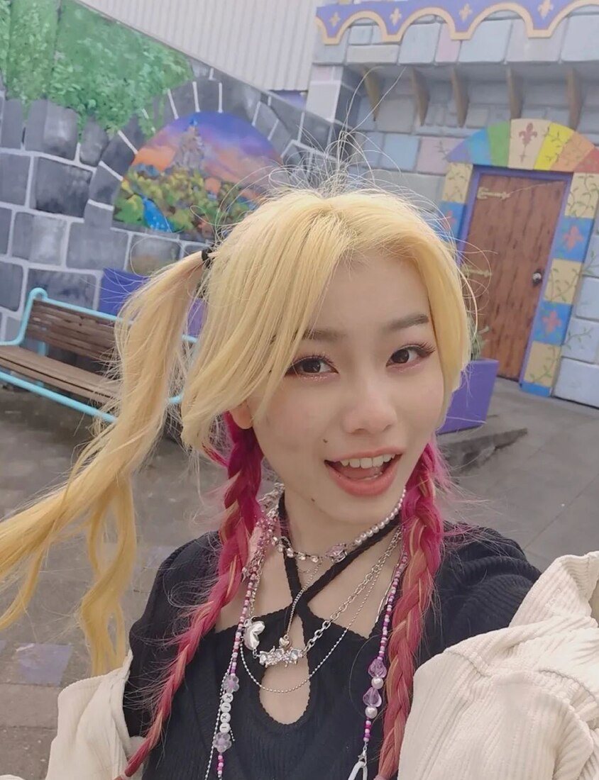 A woman with blonde pigtails