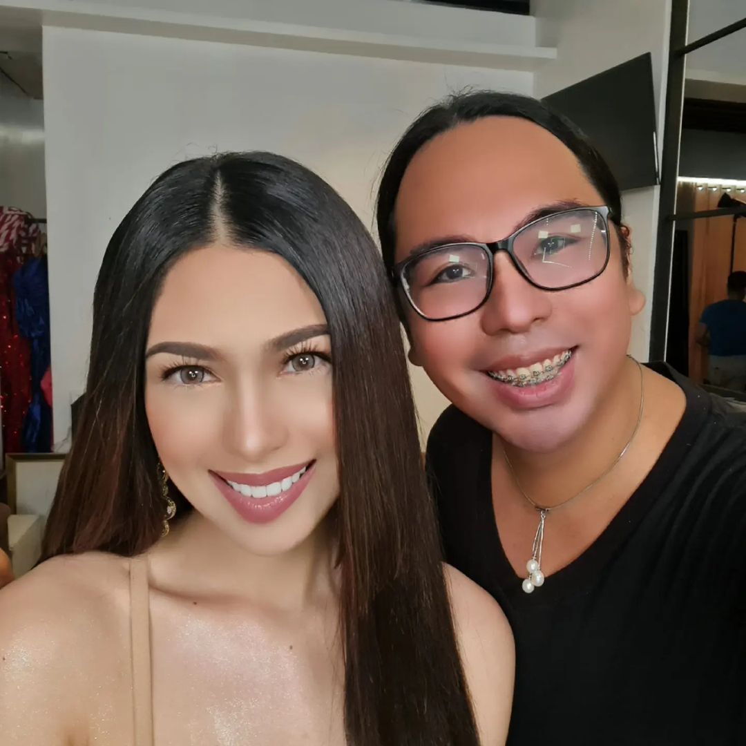 A selfie of JV Canta and a straight-haired woman.