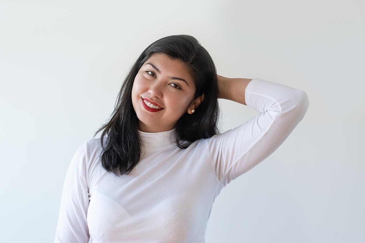 Asian woman wearing a white shirt