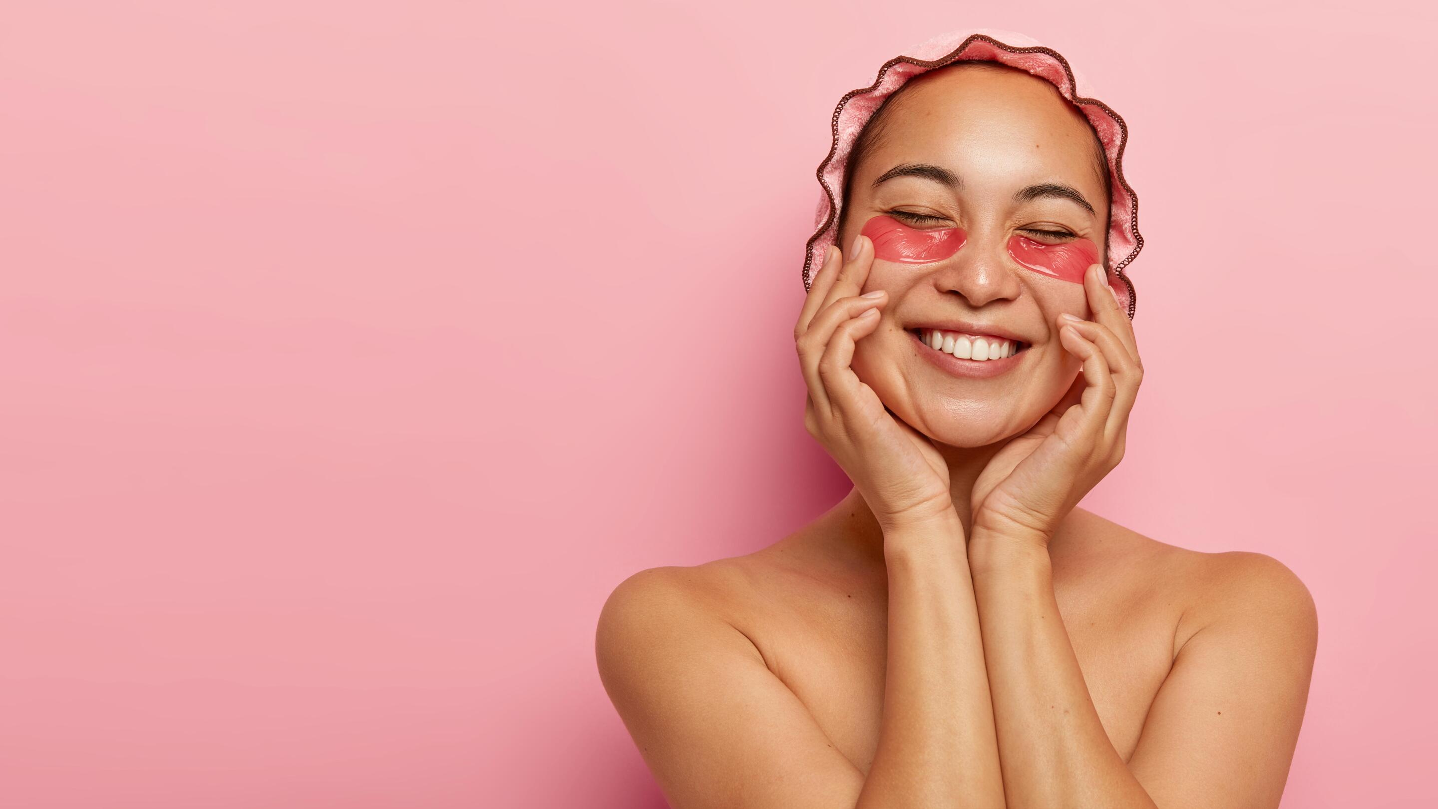 Asian with shower cap and under eye mask 