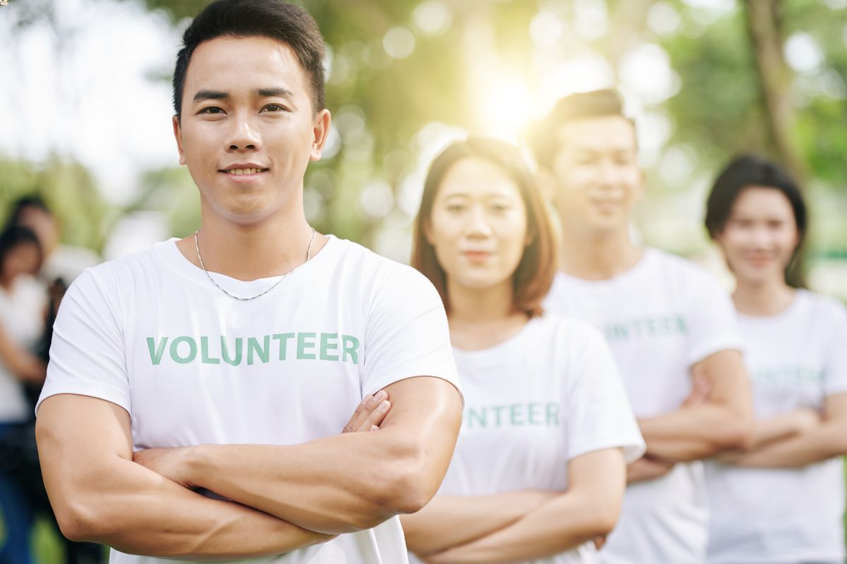Asian man volunteer work