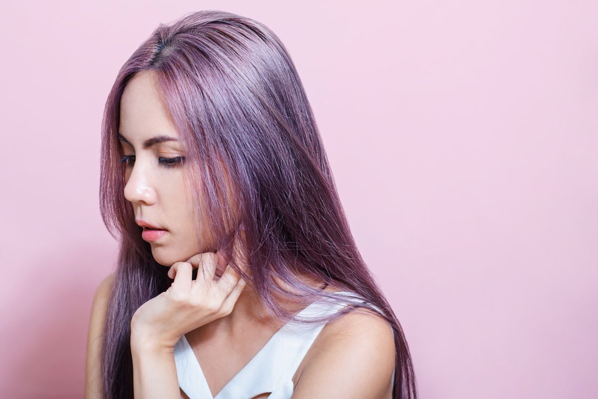 Asian woman with pastel purple hair