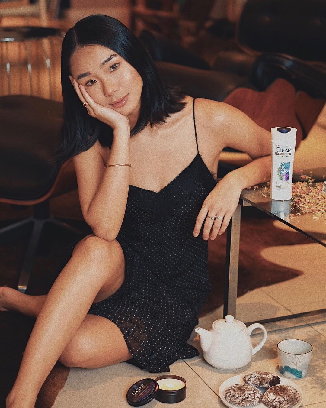 Izumi Paula posing with CLEAR Botanique.