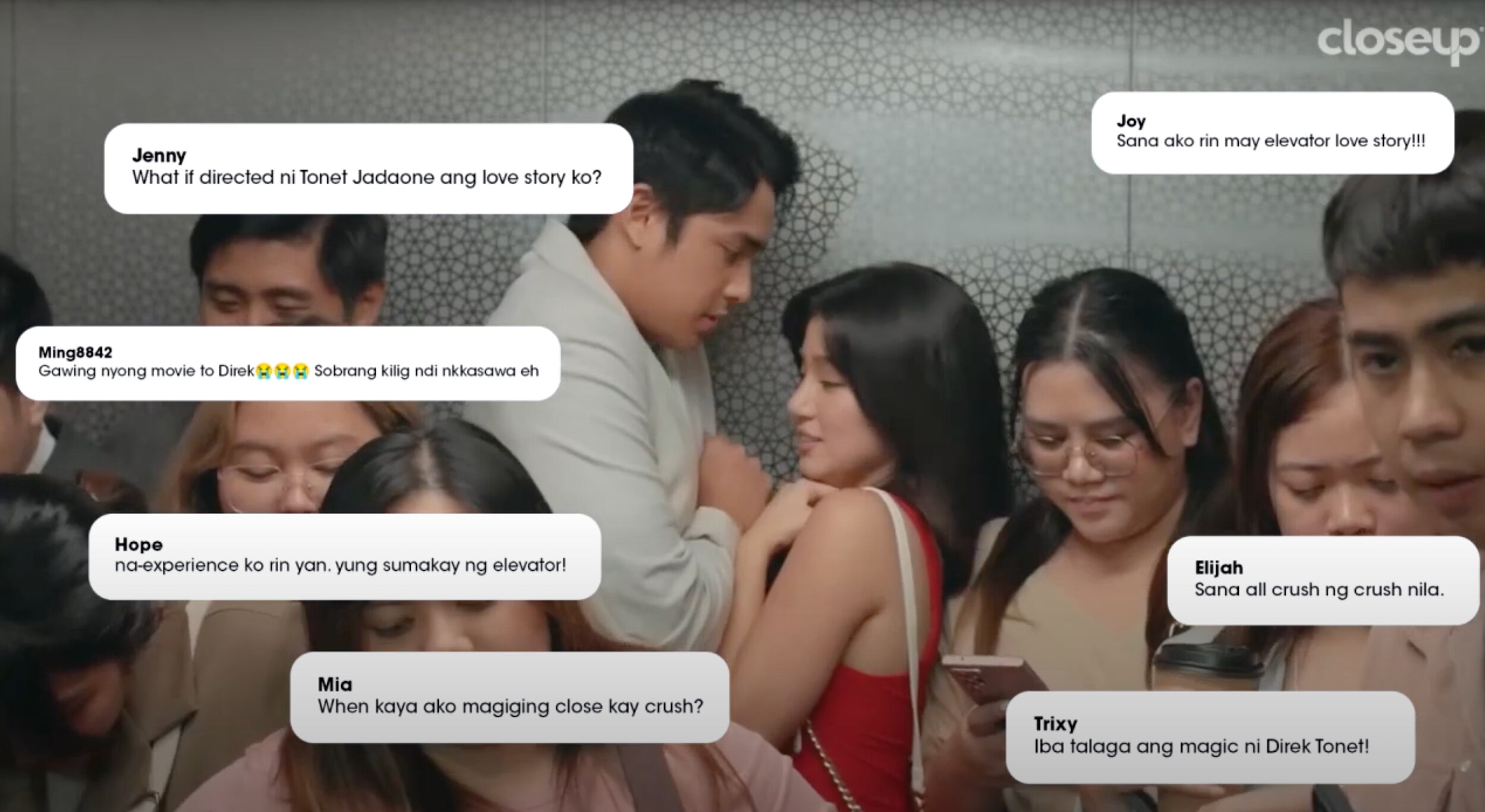 A couple in a crowded elevator.