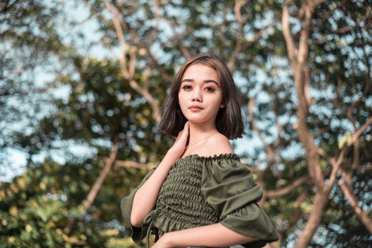 Asian woman with a lob hairstyle.