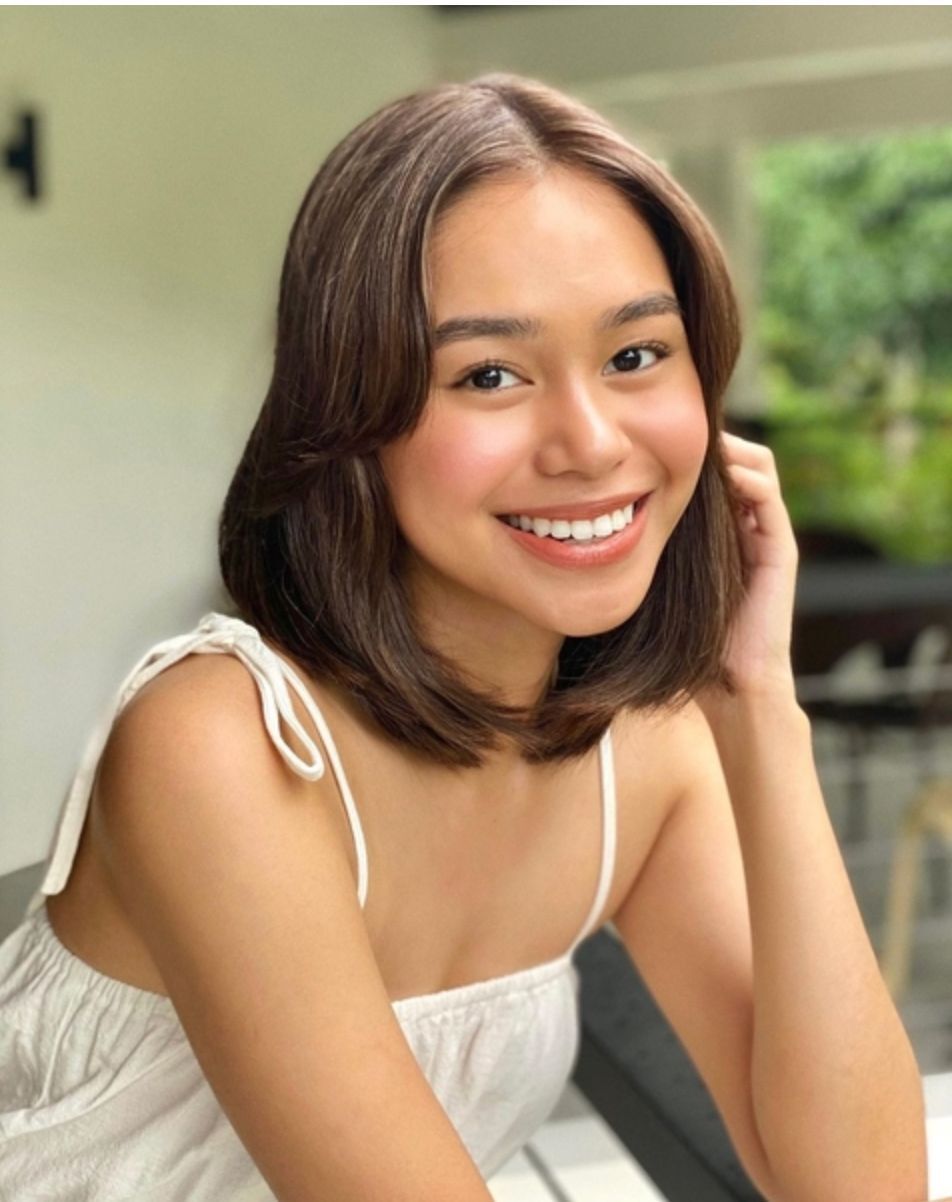 YouTube star Bella Racelis with curtain bangs.