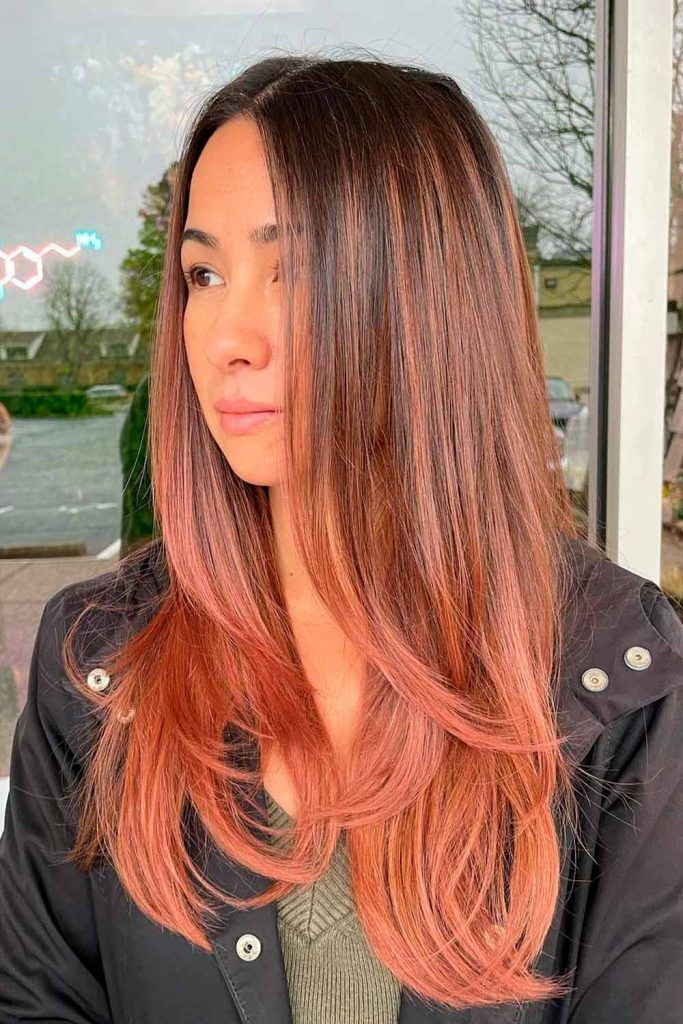 Young Asian woman with an ombre hairstyle.