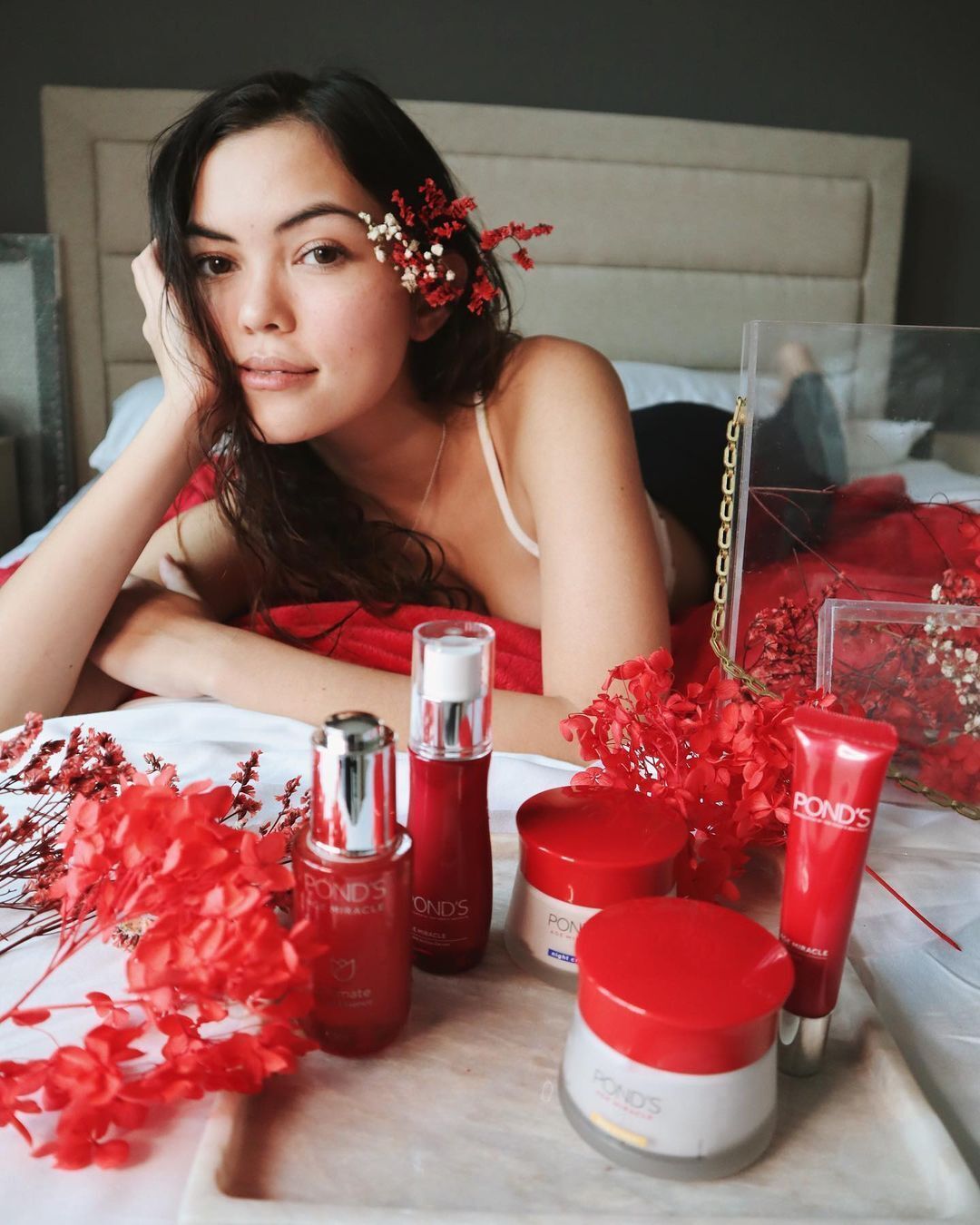 Beautiful girl with a range of skincare