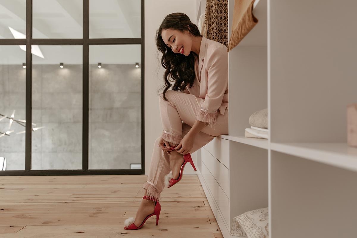 Stylish Asian woman getting ready