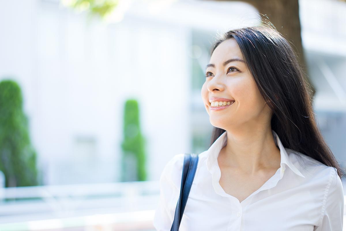 Asian woman going to work