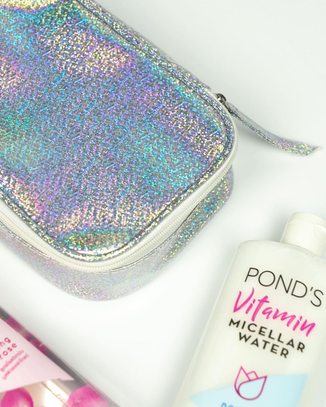 POND’S vitamin micellar water nourishing milk and a glittery bag