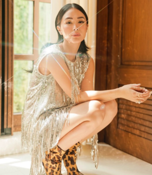 Fringe, sparkle, AND animal print in one spectacular snap. 