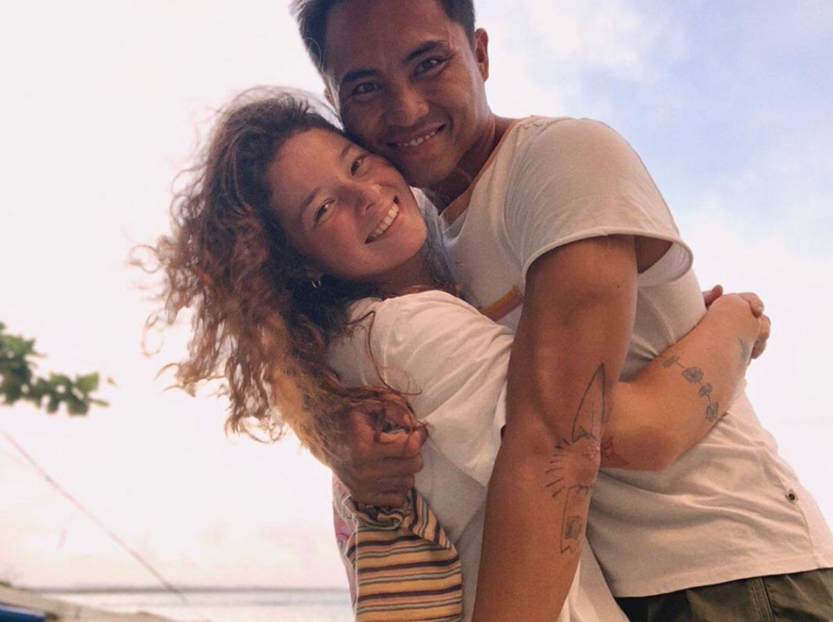 Asian couple at the beach.