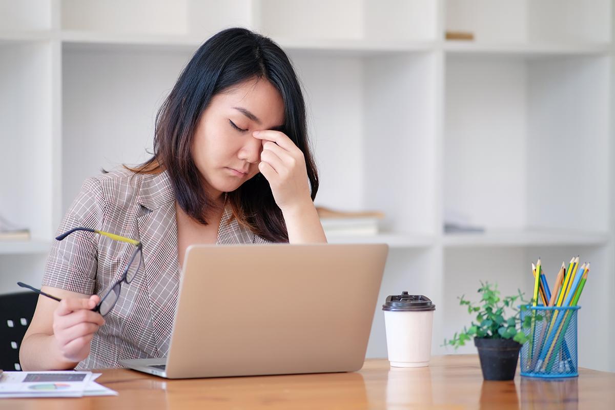 Woman stressed out at work