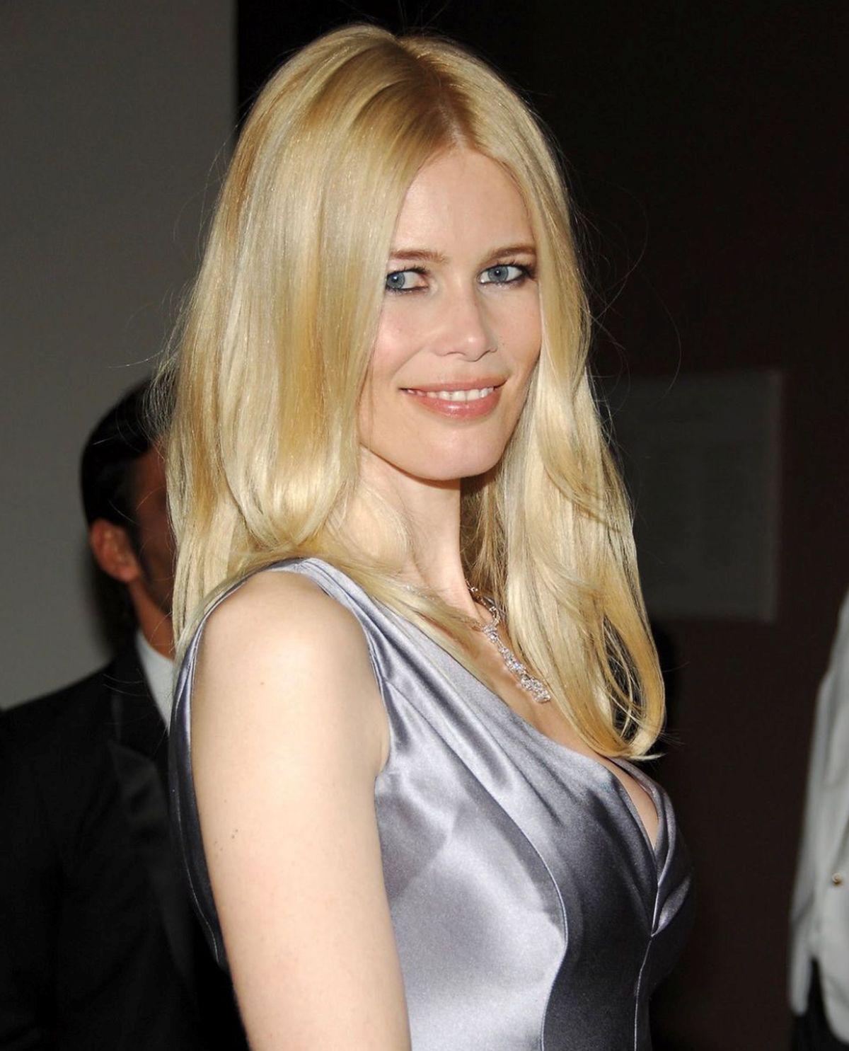 Claudia Schiffer blonde hair in a silver dress 
