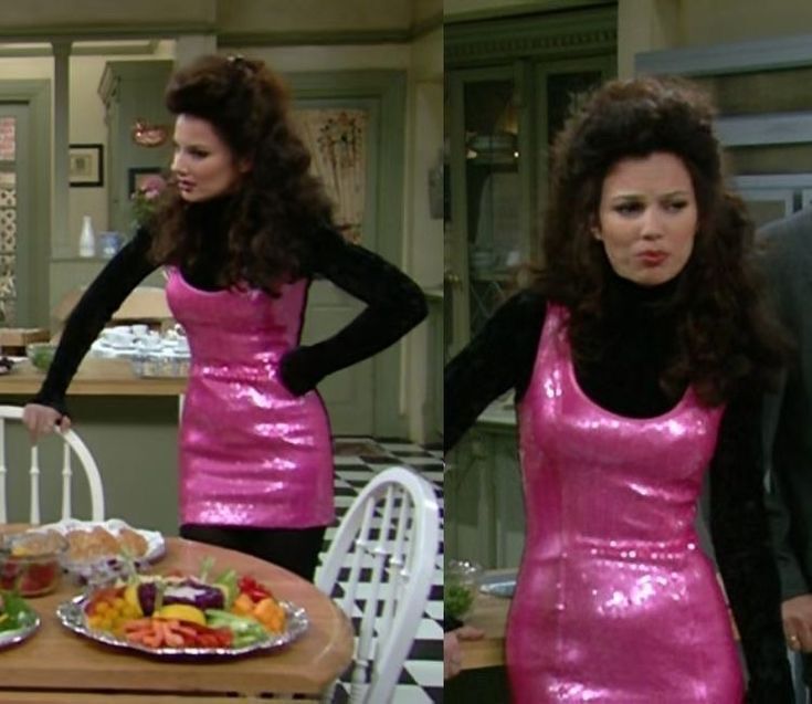 Fran Fine from The Nanny wearing black turtleneck under a metallic pink dress.