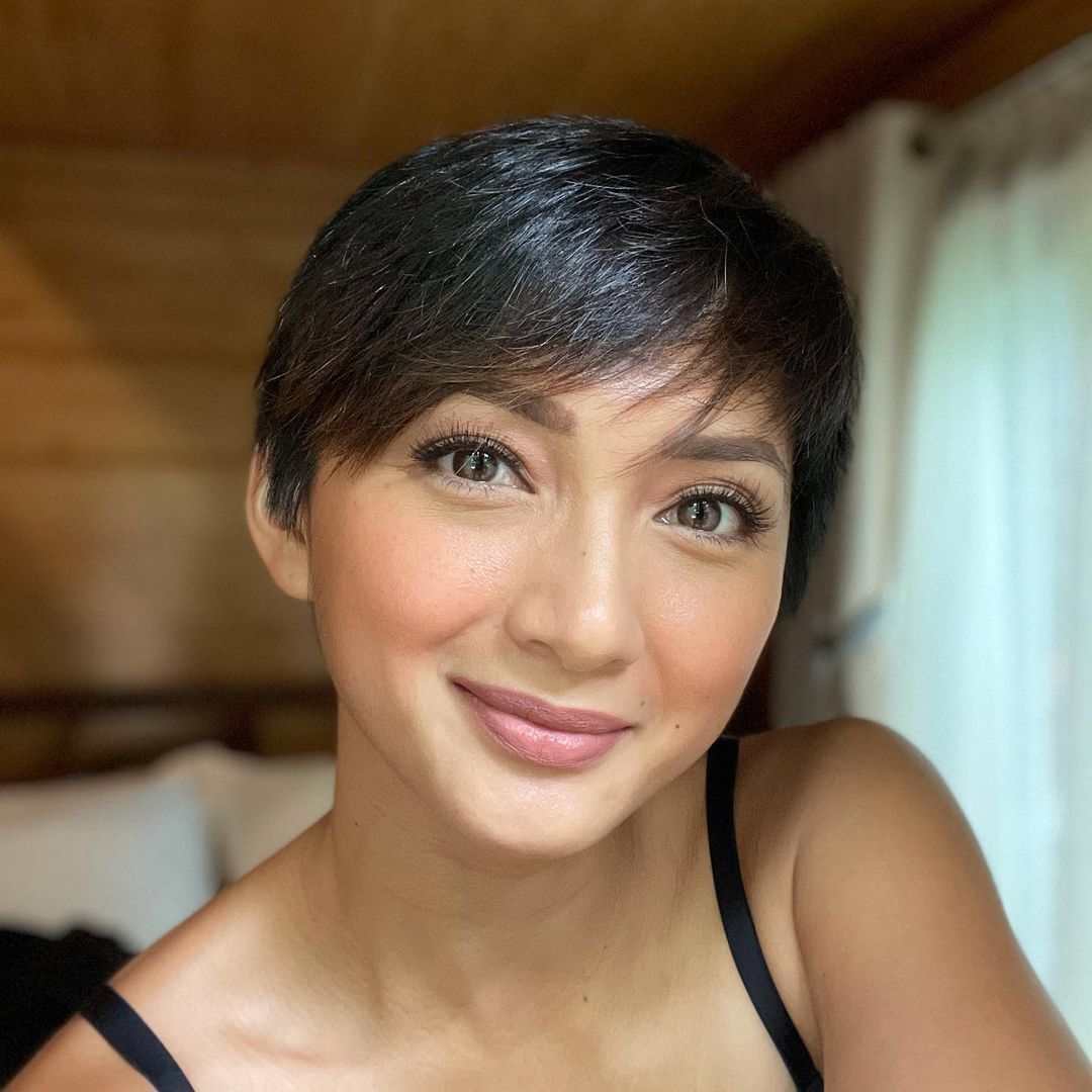 Iya Villania in a black tank top with pixie cut. 