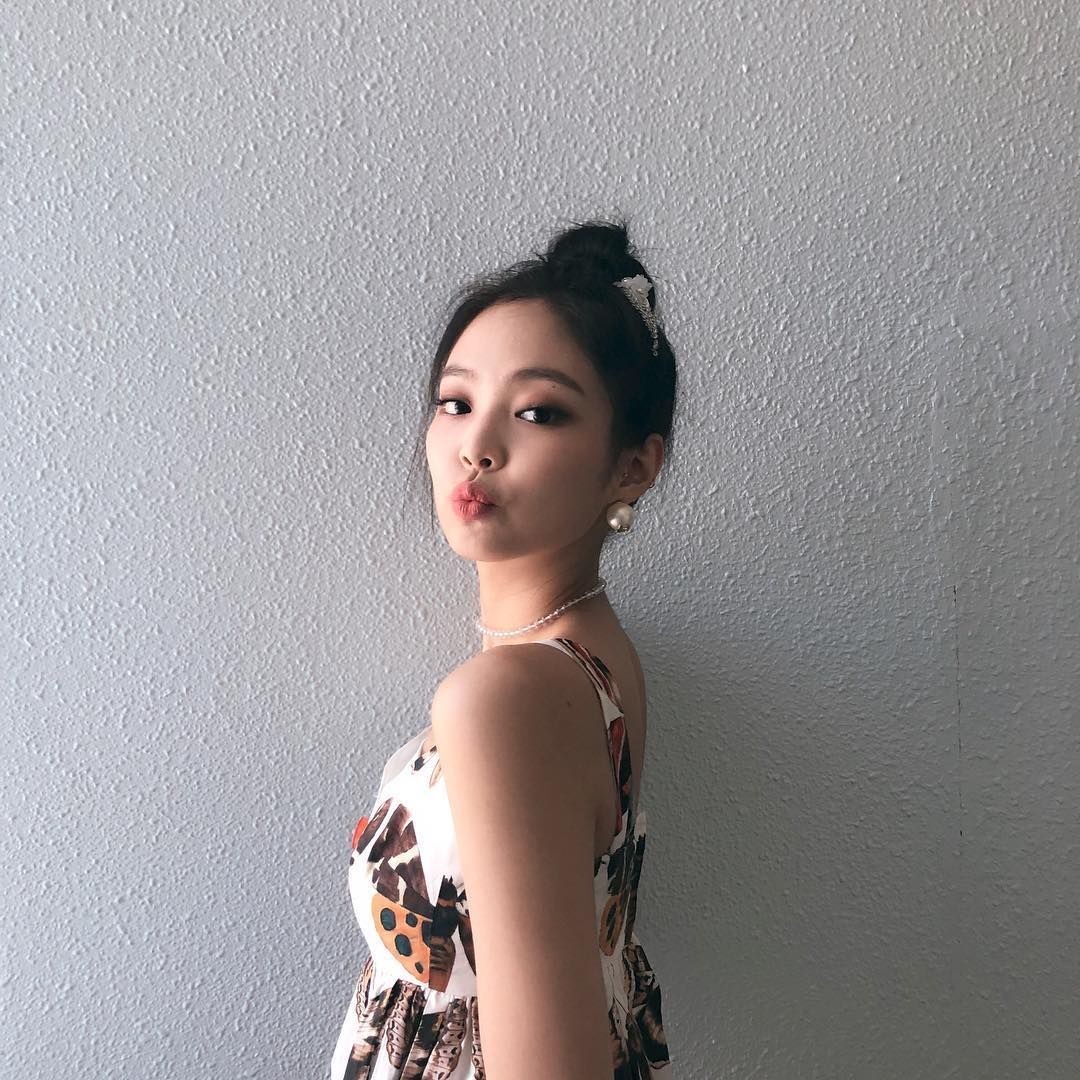 Jennie BLACKPINK with a top knot.