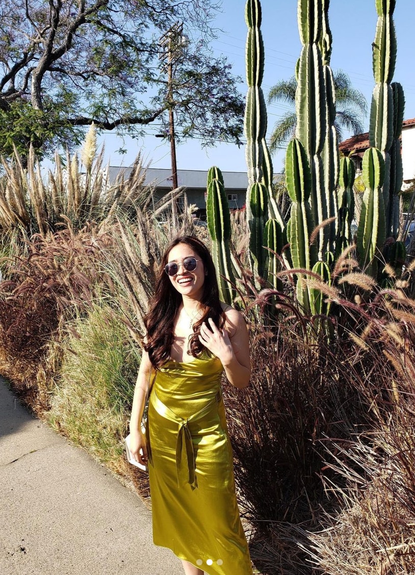 woman in front of a mirror