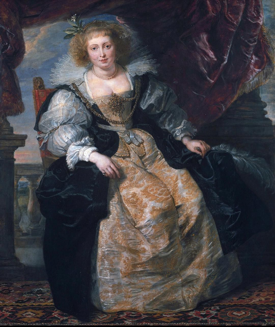 A painting of Helena Fourment sitting on a chair.