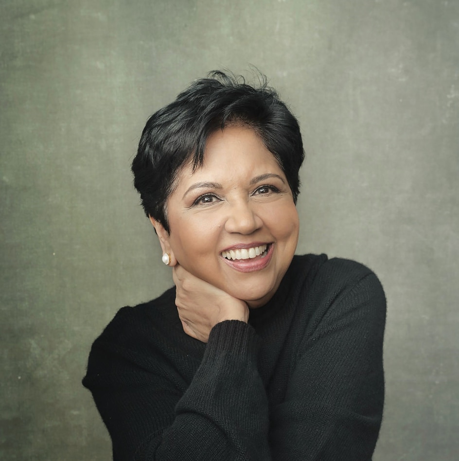Indra Nooyi's headshot for her book, wearing a black sweater