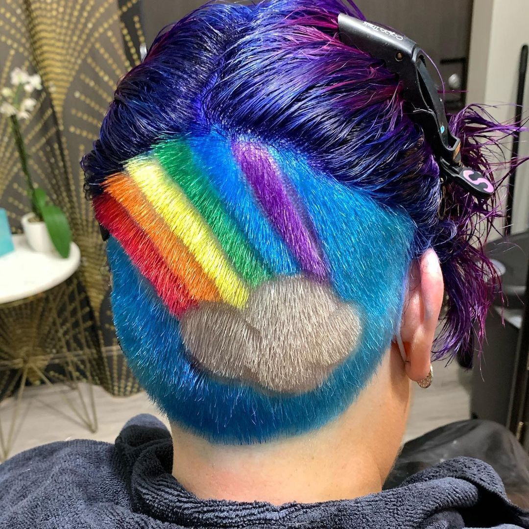 Back view of an undercut with a rainbow design.