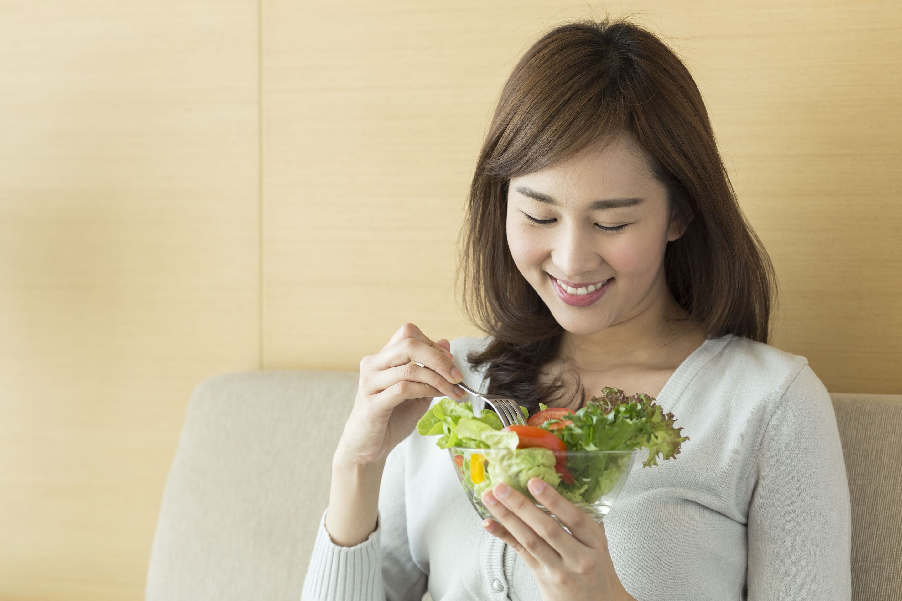 Asian girl eating healthy food