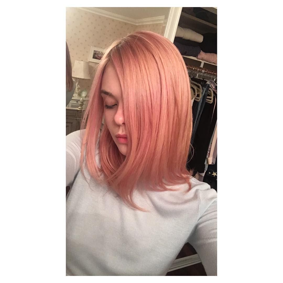 Elle Fanning selfie with pink hair and white shirt