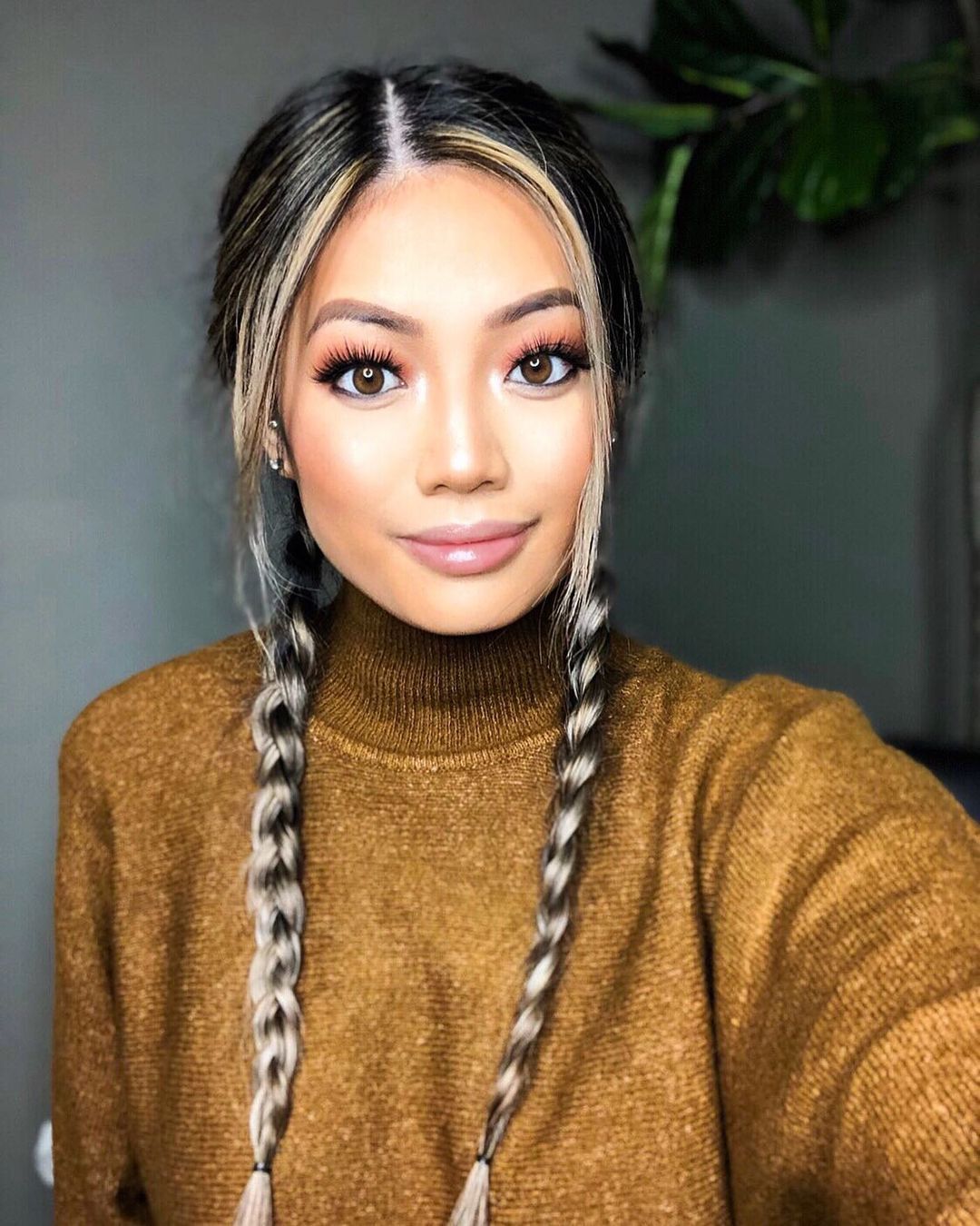Woman with two French braids. 