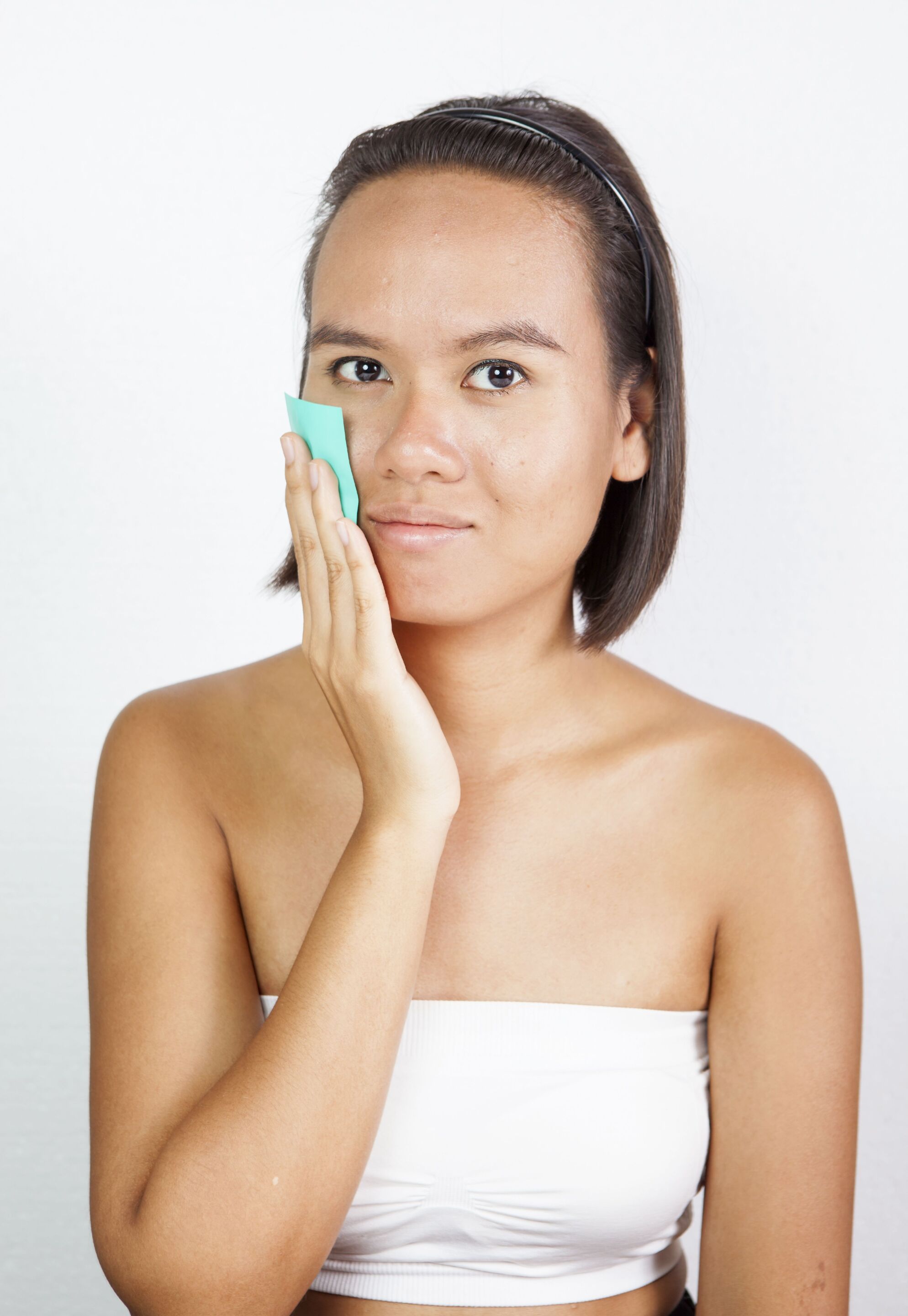 Woman with oily, acne prone skin