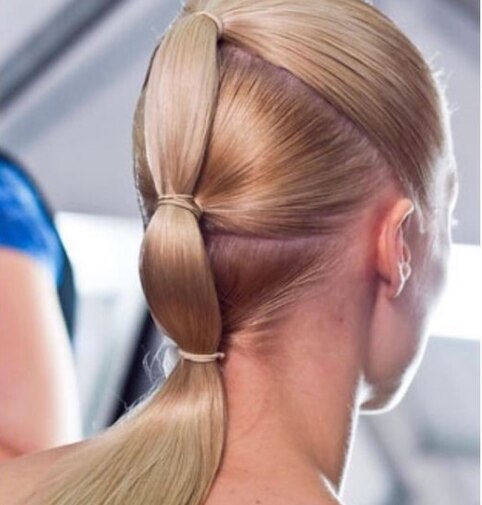 Woman with a triple ponytail