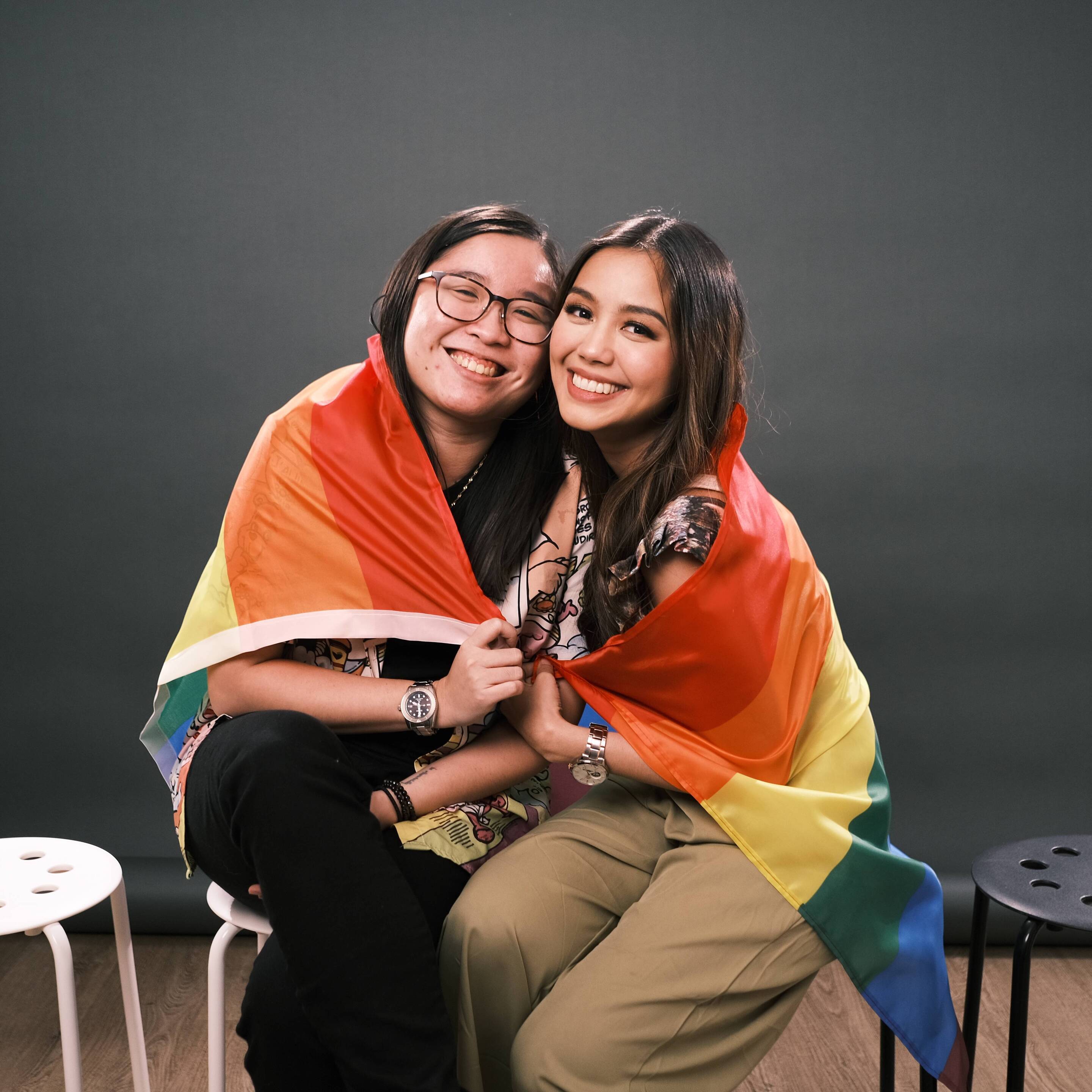 Two women smiling together.