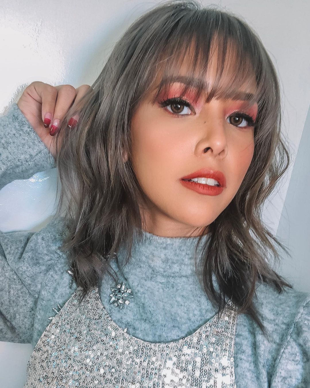 Patricia Prieto with silvery black hair