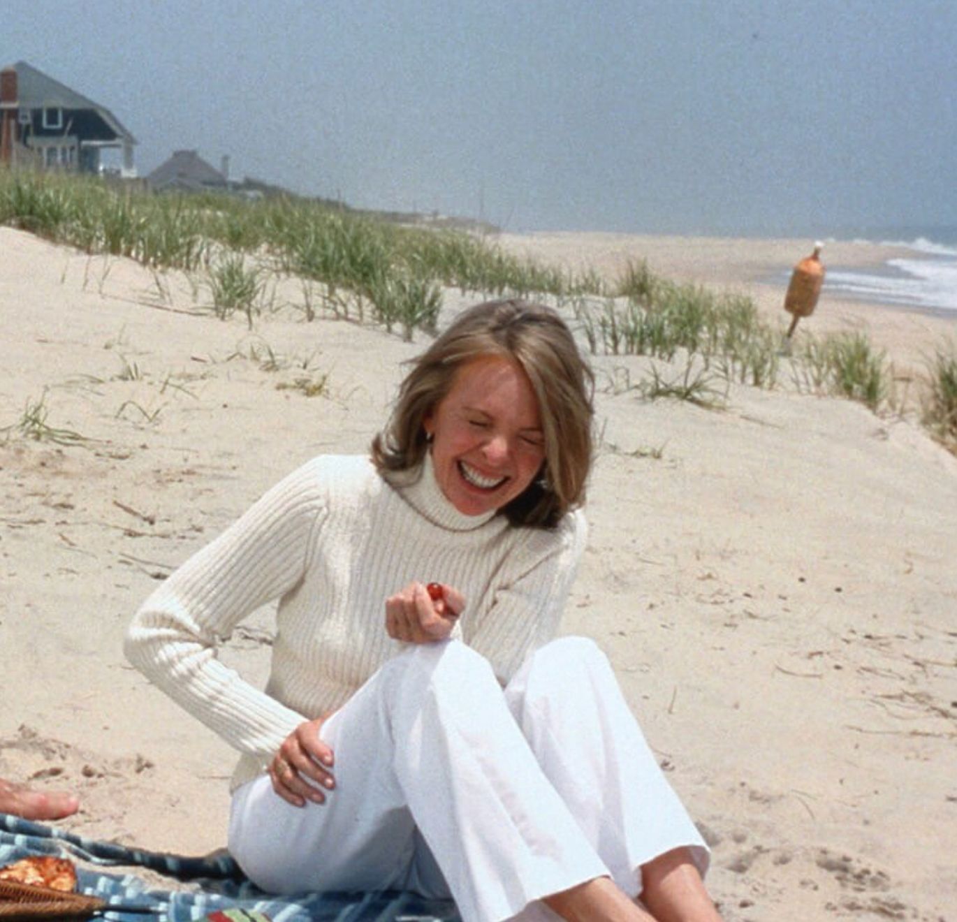 Diane Keaton wearing white on the beach