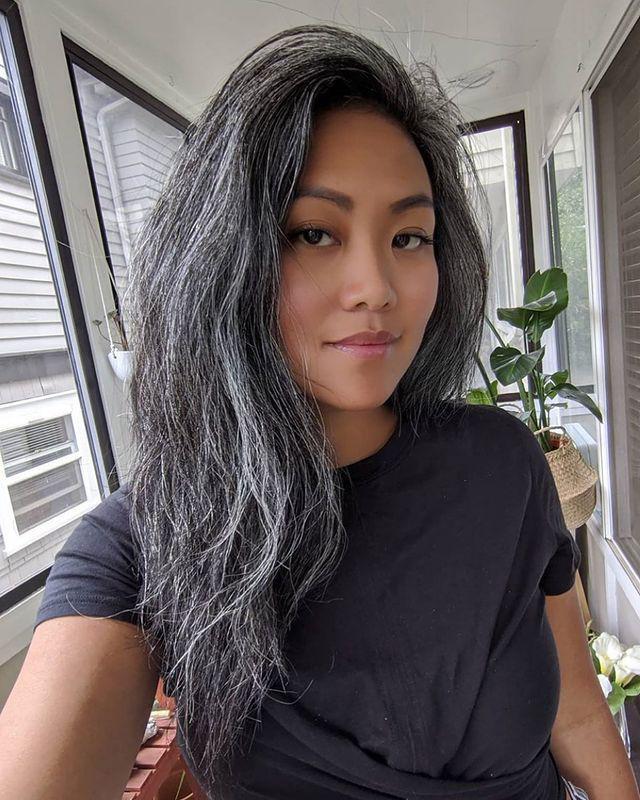 Asian woman with natural gray hair