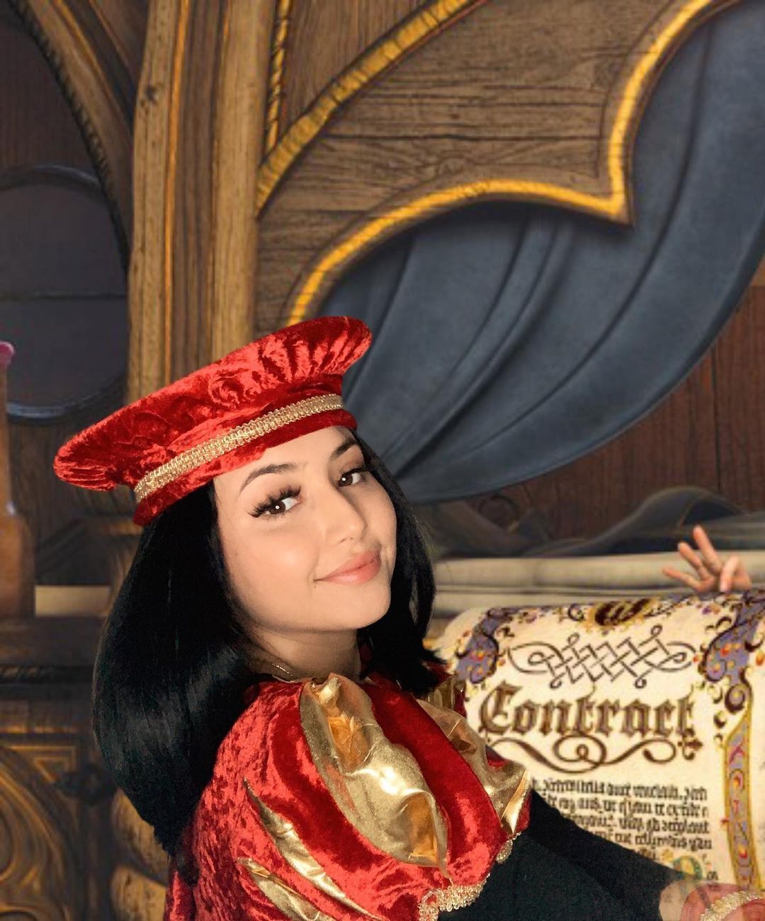 A woman dressed up as Lord Farquaad from Shrek.