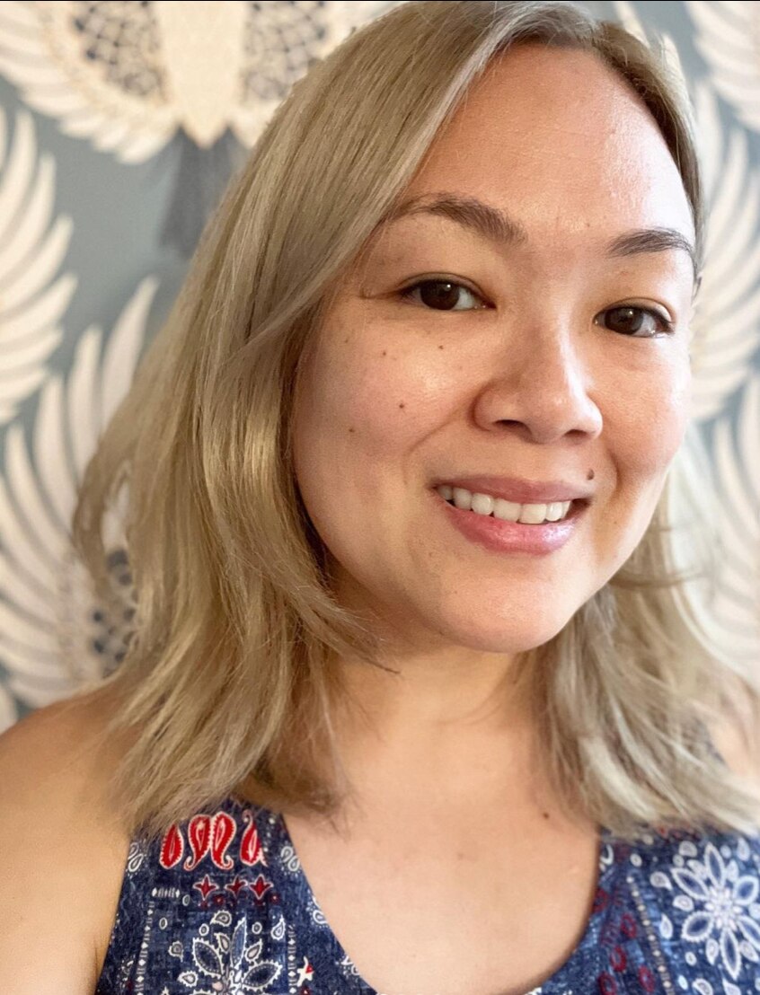 Selfie of an Asian woman with blonde hair