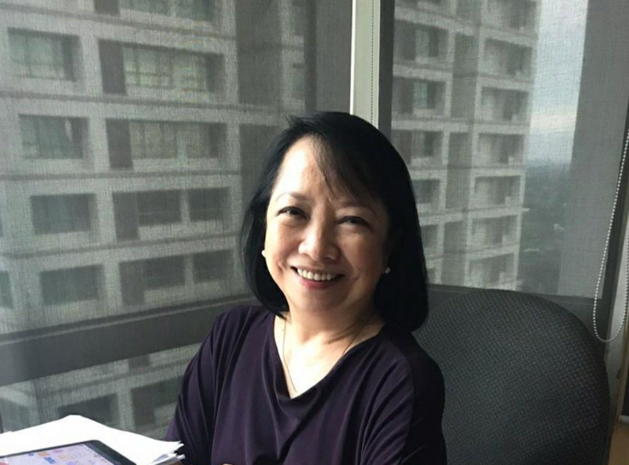 Woman with short, black hair