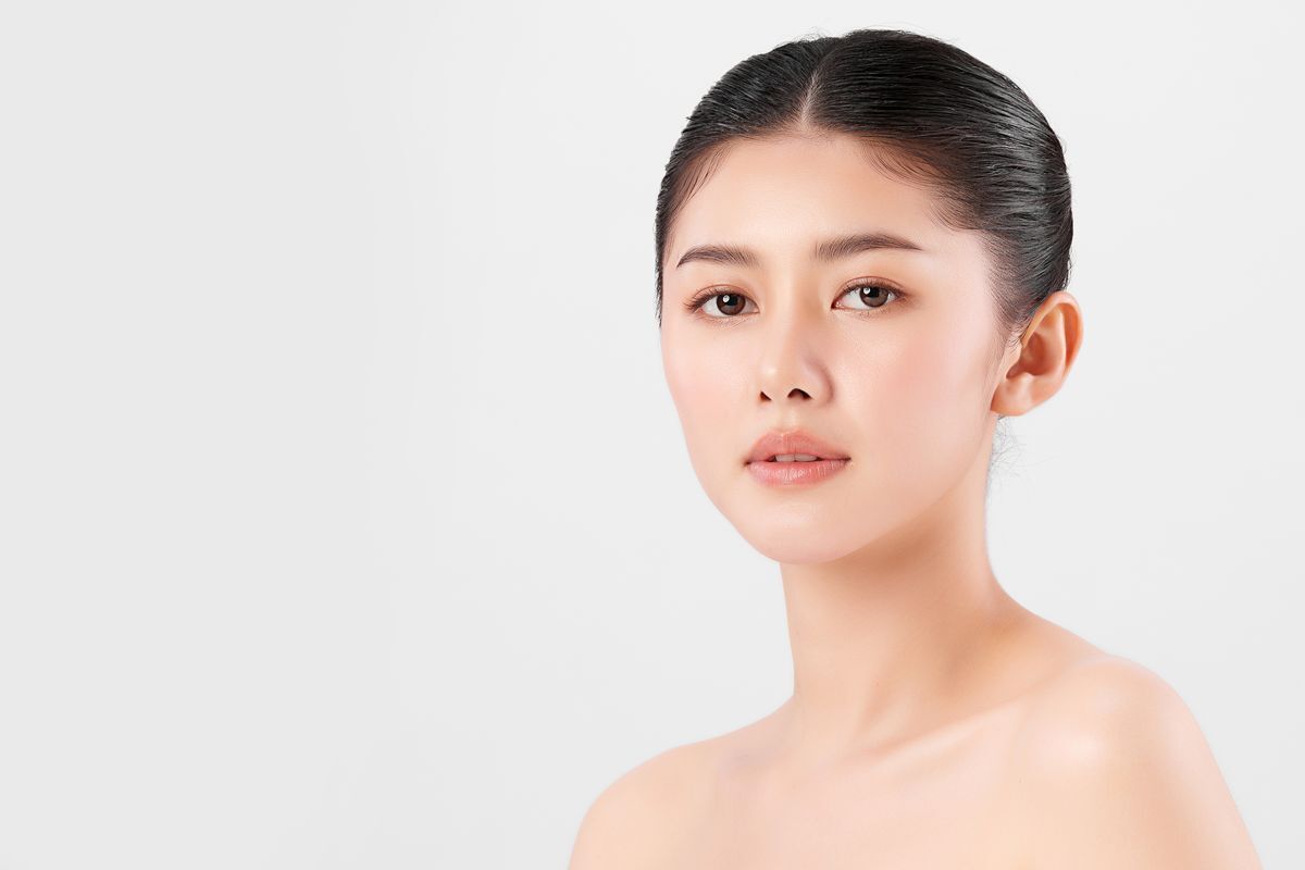 Asian woman with hair up