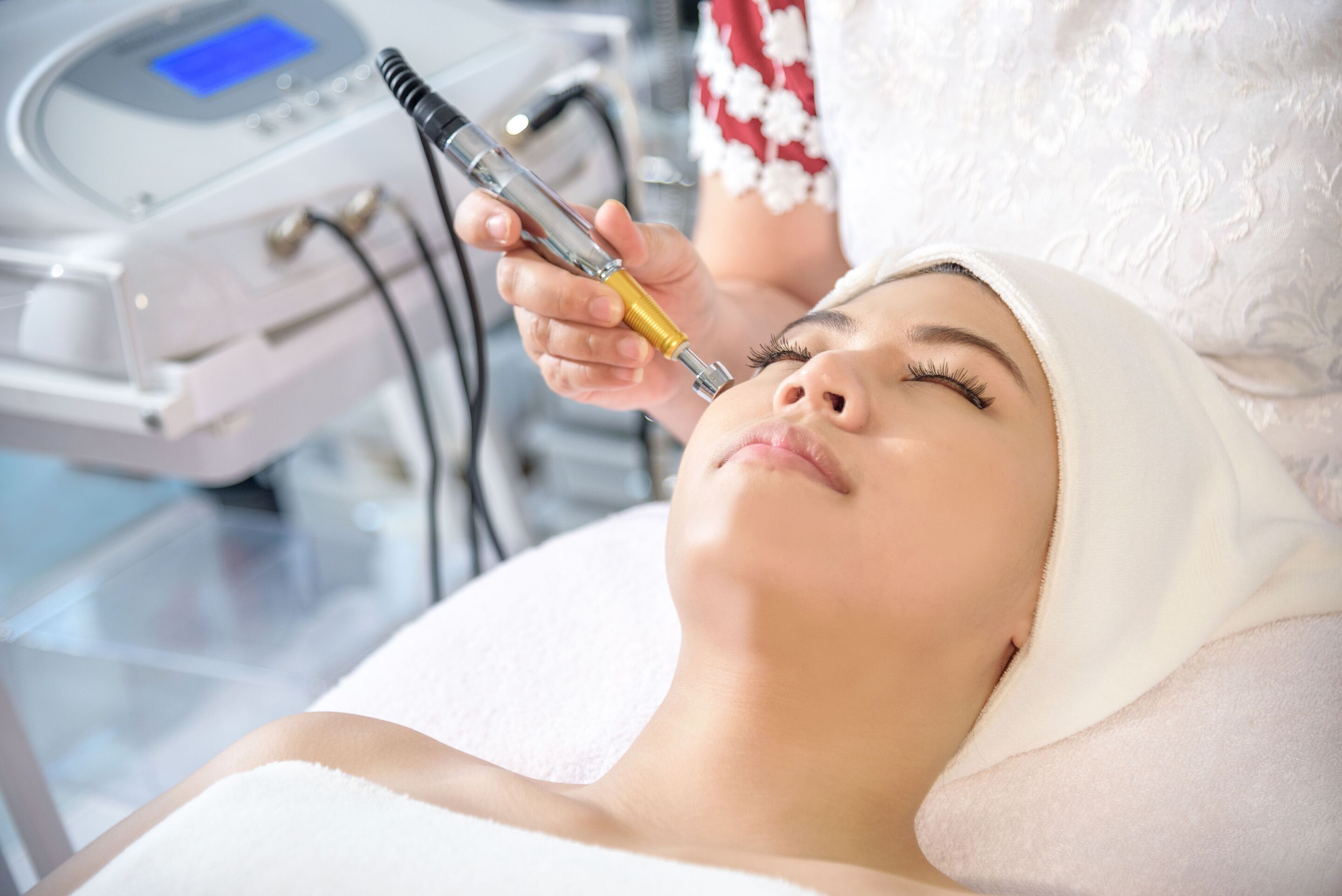 A woman getting a microdermabrasion