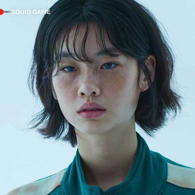 Asian woman with a short wolf cut