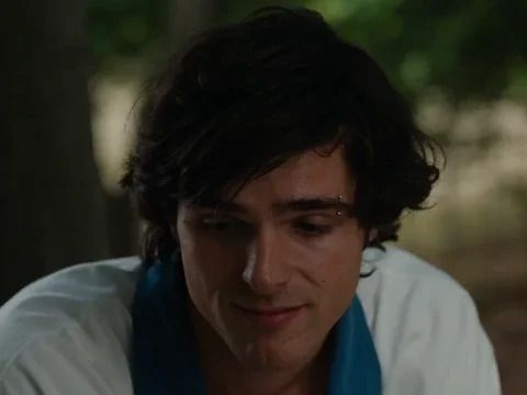 A gif of Jacob Elordi being a babygirl in Saltburn.