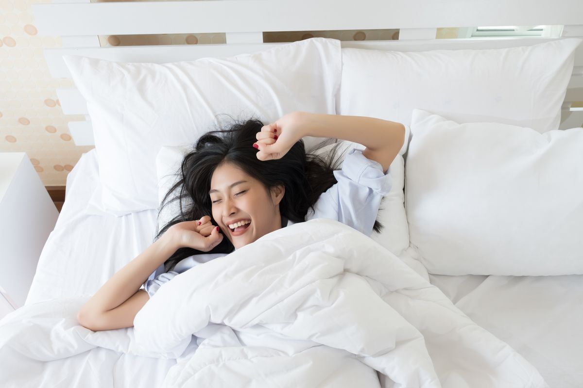 Woman happy waking up